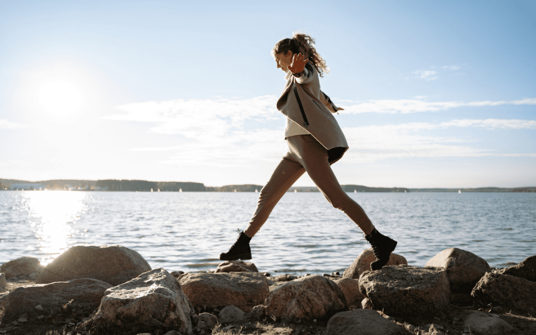 Woman walking along the rocks on Wellington waterfront - using a pesssary for prolapse
